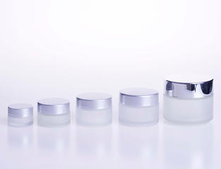Cream jar in frosted glass with silver caps 
